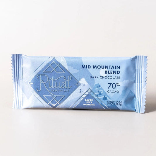 Dark chocolate bar with 'Ritual' branding on a light background