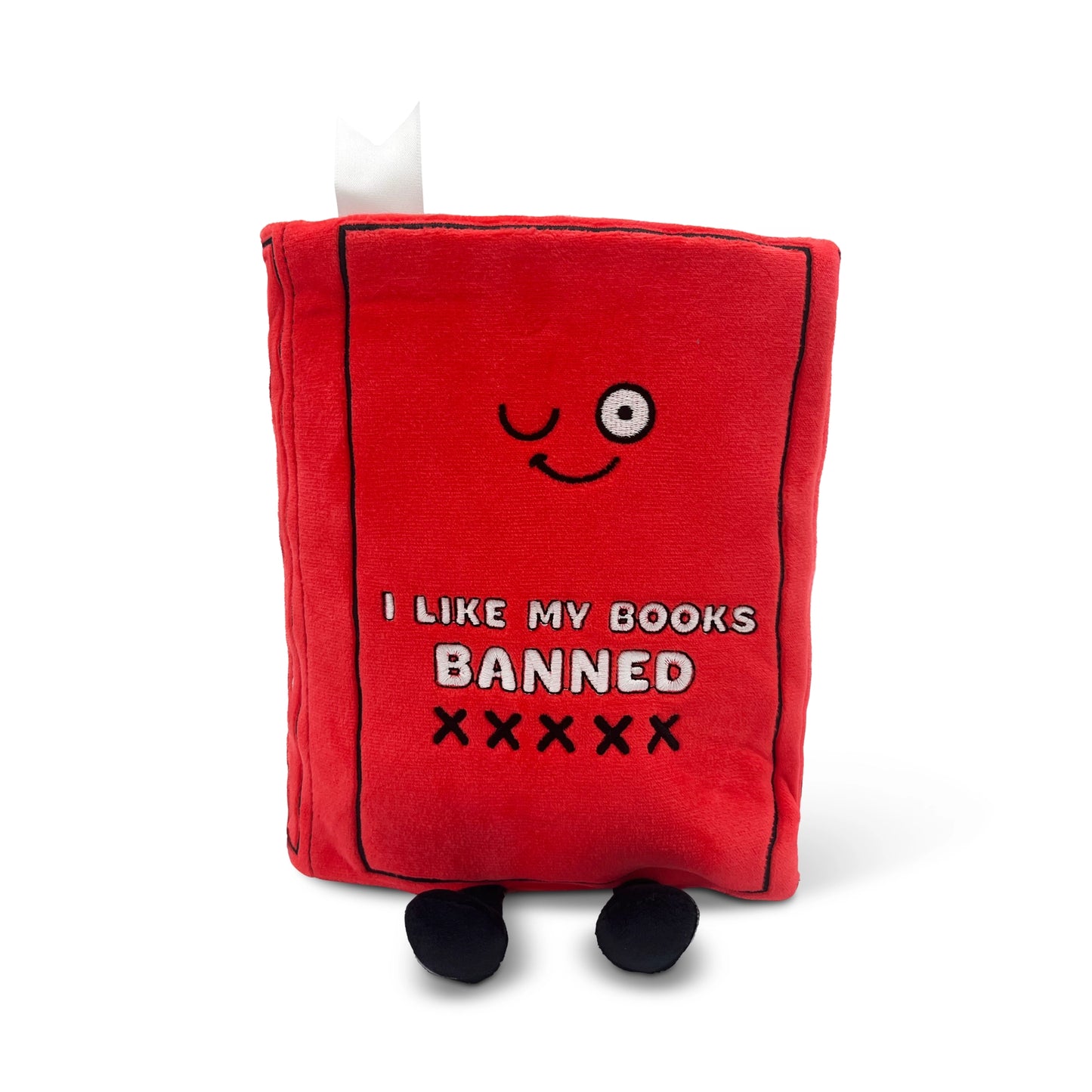 Red plush book-shaped toy with a smiley face and text on a white background