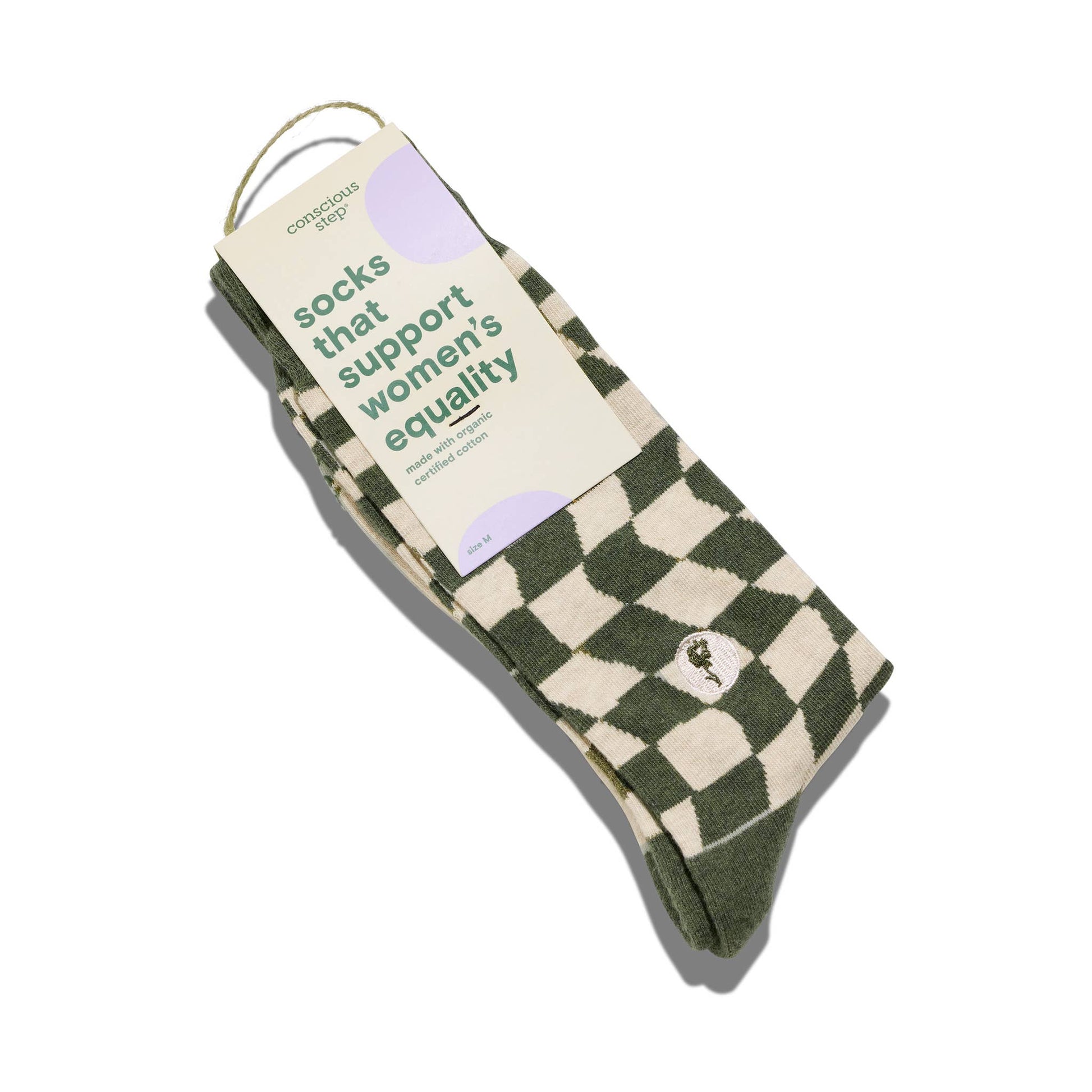 Green and beige checkered socks with a label on a white background
