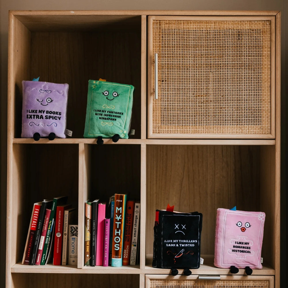Wooden bookshelf with decorative items and books