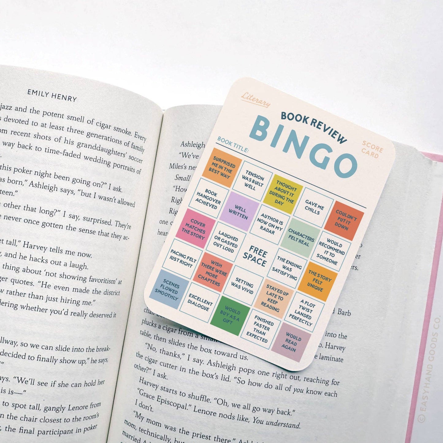 Book review bingo card on an open book